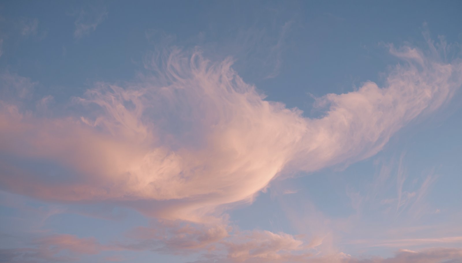 Soft pink clouds over Colorado — EMDR therapy Colorado Springs